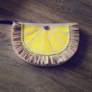 Brand new Lemon Clutch with matching earrings